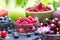 Organic forest berries, healthy vegetarian food, healthy fresh fruit on table