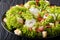 Organic French Lyonnaise salad with lettuce, bacon, croutons and