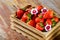 Organic fresh strawberries in the box on wooden vintage table