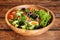 Organic Freshness: Wholesome Salad Bowl on Rustic Wooden Table