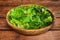 Organic Freshness: Wholesome Salad Bowl on Rustic Wooden Table