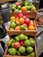 Organic fruits displayed in wooden crates for a breakfast buffet