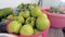 Organic garden products, all natural apples, pears, tomatoes, standing in large bowls on the balcony of a house