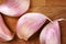 Organic garlic on wooden chopping board