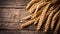 Organic golden wheat grains on wooden table with copy space, eco friendly background decoration