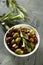 Organic Greek olives in a white bowl