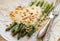 Organic green asparagus, baked with cheese and pine nuts