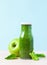 Organic green smoothie in bottle. Natural Organic Food Style.