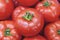 Organic healthy fresh big red ripe tomatoes on the market on sun