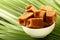 Organic jaggery cubes on palm tree leaf