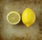 Organic lemon on an old rustic stone chopping board