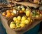 Organic lemons in a wicker basket on the table exposed to the local market on which it sells natural, organically grown fruits and