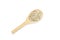 Organic millet seed on wooden spoon on white background