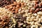 Organic mixed nuts as background, closeup.