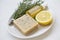 Organic natural spa and skincare ingredients with natural soap, lemon, oil bottle and rosemary herb, natural spa ingredients,