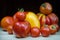 Organic natural tomatoes, different colors and shapes