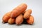 Organic and nutritious sweet potato with vibrant colors isolated on a clean white background