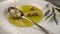 Organic olive oil. Extra virgin oil pouring in to the spoon.