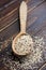 Organic quinoa grains in wooden spoon, Gluten free. Concept Healthy food. Seeds of Chenopodium quinoa