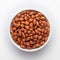 Organic red brown peanuts Arachis hypogaea in white Ceramic bowl,