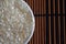Organic rice in small plate texture, Asian uncooked short milled rice as background . The concept of proper nutrition and healthy