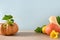 Organic ripe pumpkins on colorful blue and beige background. Autumn harvest for Thanksgiving Day or Halloween Party.