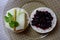 Organic sandwiches with goat pressed cheese and blackcurrant jam