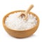 Organic sea white salt tablets in a wooden bowl on white background