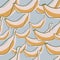 Organic seamless pattern with doodle orange random contoured banana print. Blue background. Fruit artwork