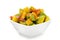 Organic sliced Indian Mango (Mangifera indica) in white bowl.