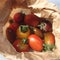 Organic Small Tomatoes in a Brown Paper