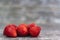 Organic strawberries on rustic background with copy space