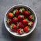 Organic Strawberries in White Dish Vibrant Fruit on Gray