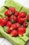 Organic strawberry, fresh fruit. Wooden background