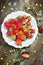 Organic strawberry, strawberries in white rustic plate