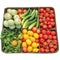 Organic vegetable assortment in basket tomatoes, cucumbers, eggplants, beans
