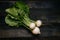 Organic vegetables. Fresh harvested turnip on the dark wooden background, top view