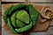 Organic vegetables : green cabbage on a wooden board