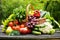 Organic vegetables in wicker basket in the garden