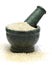 Organic White Sesame (Sesamum indicum) on marble pestle.