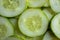 Organic Young Green Mangoes Branch Macro isolated on Wooden Table sour fruits.