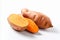 Organically cultivated sweet potato with vibrant hues isolated on a pristine white background