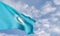 Organization flag  Turkic Council on the background of clouds, fabric flag Turkic Council, blue sky background with Turkic Council