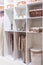 Organization of Home Space and Comfort of the Interior and Storage of Things on the Shelves in the Closet in Wicker Straw Baskets