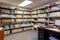 organized business document library with tidy bookshelves and labeled folders