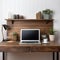 Organized Workspace: Sleek Desk with Laptop, Notepads, Pens, and Paperclips