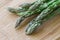 Orgarnic fresh asparagus wooden block