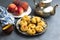 Oriental Algerian sweet cookies mchawak named in arabic , silver teapot and fresh peach fruit