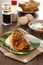 Oriental breakfast set in Malaysia consisting of coffee, nasi lemak, toast bread and half-boiled egg