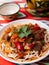 The oriental lagman dish is homemade noodles fried with meat, vegetables and herbs. Eastern cuisine